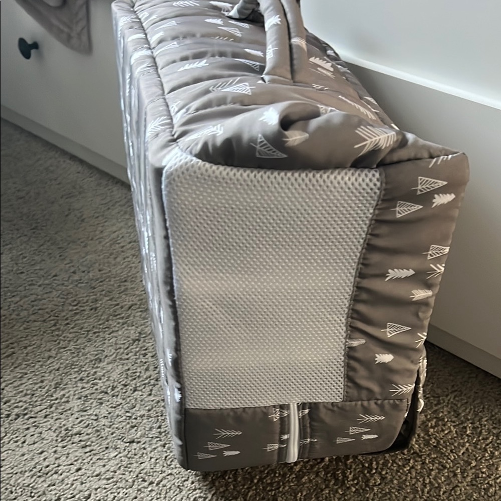 Gray baby delight portable bassinet with White Tree Design